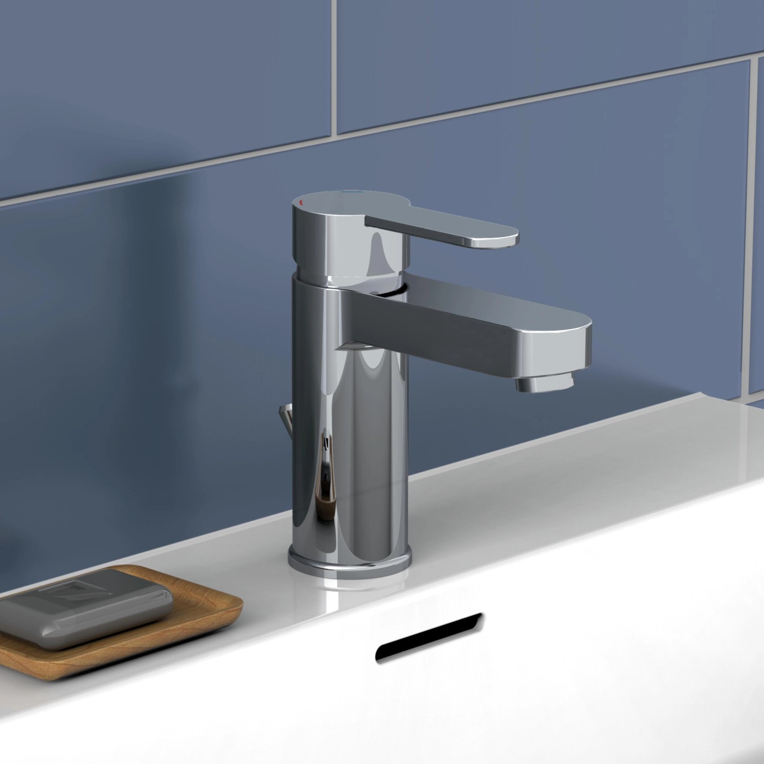 Schütte Waschtischarmatur Elephant Chrom auf weißem Waschbecken vor blauer Wand.