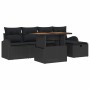 Schwarzes 6-teiliges Garten-Sofa-Set aus Poly Rattan mit Tisch und Kissen.