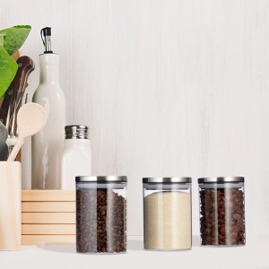 Relaxdays Vorratsgläser, 3er Set aus Borosilikatglas mit silbernen Deckeln, gefüllt mit Kaffee, Zucker und Schokostückchen.