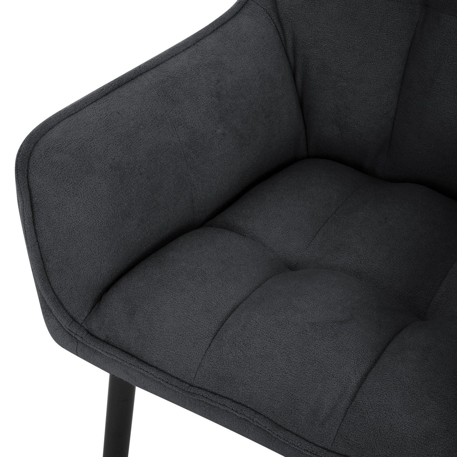 Detailaufnahme: Schwarzer ML-Design Esszimmerstuhl mit Frotteebezug und dicker Polsterung.