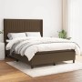 Dunkelbraunes Boxspringbett 140x190 cm mit Stoffbezug und Matratze.