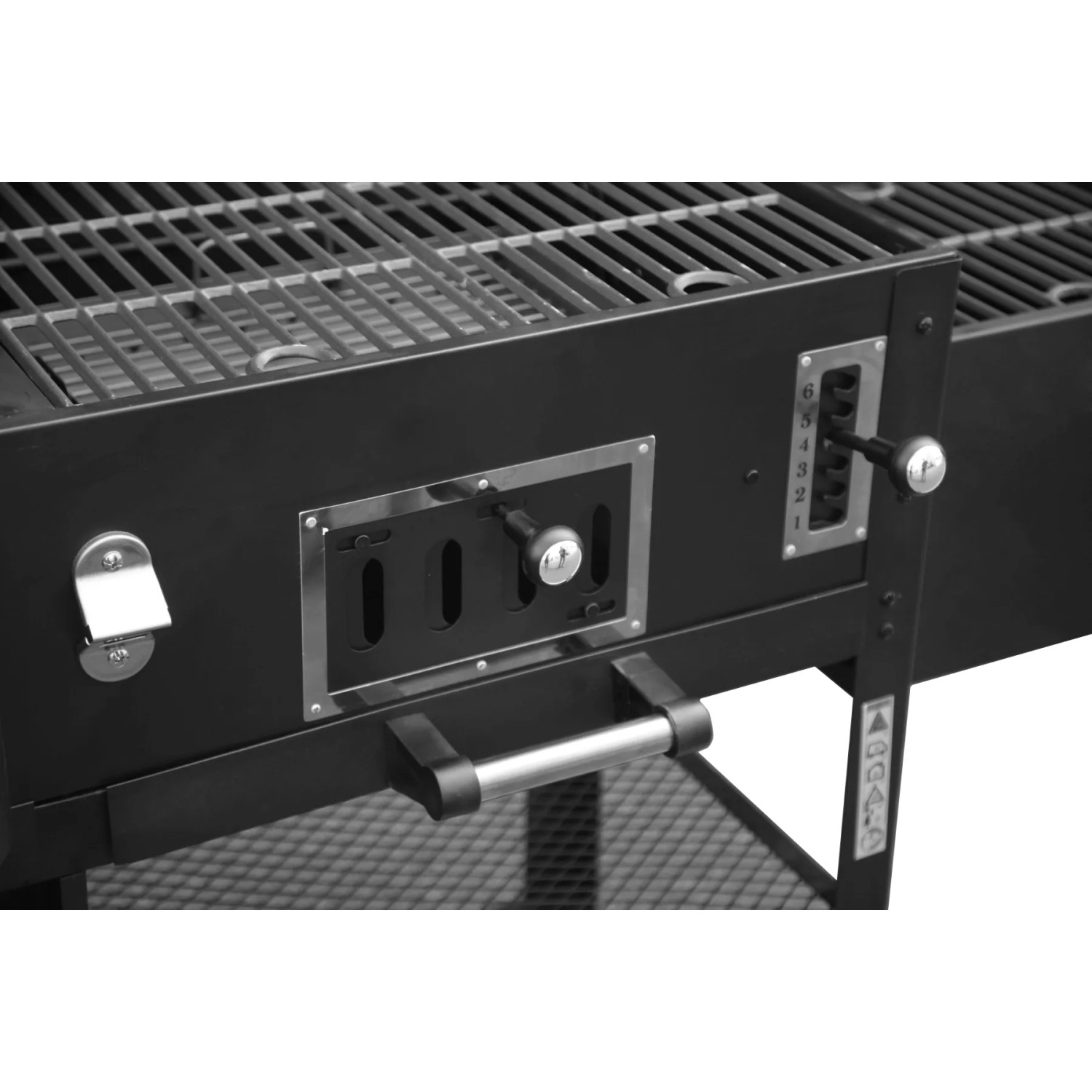 Detailaufnahme des El Fuego Arizona Kombigrill: Kohle- und Gaskammer mit Temperaturregler.