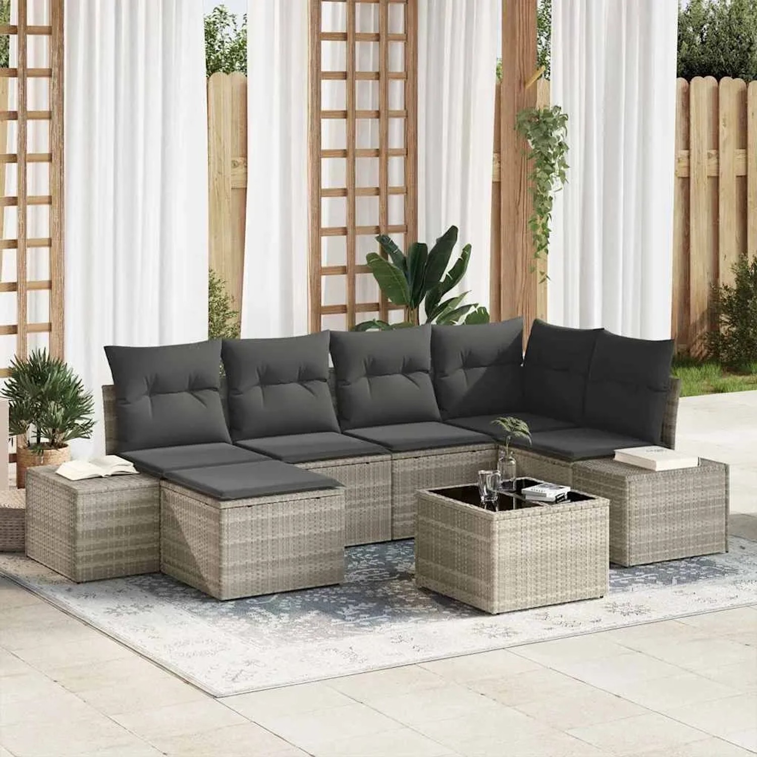 Hellgraues 7-teiliges vidaXL Garten-Sofa-Set aus Poly Rattan mit Kissen.