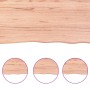 Hellbraune Waschtischplatte aus Massivholz (Eiche) mit Naturkante, 100x40 cm.