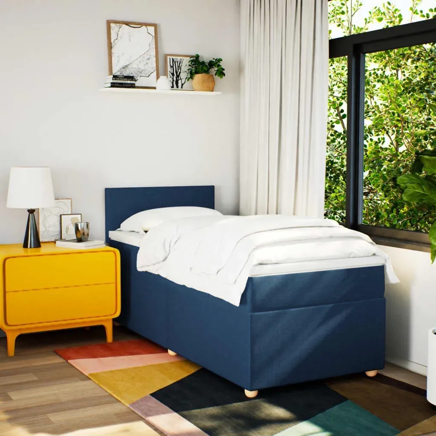 Blaues vidaXL Boxspringbett (90x190 cm) mit Matratze und Auflage im Schlafzimmer.