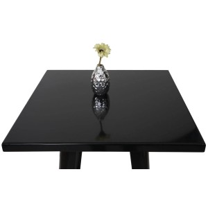 Schwarzer CHEFGASTRO Stehtisch im Industriedesign mit Metallgestell und Deko-Vase.