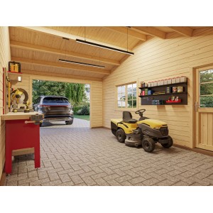 Innenansicht: Palmako Garage Roger, lackiert grau-weiß, mit Werkbank und Rasentraktor.