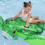 Bestway Schwimmtier Tidal Turtle mit Kind im Pool, grüne aufblasbare Wasserschildkröte mit Haltegriffen.