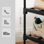 Detailaufnahme: Schwarzes Songmics Schuhregal mit drei Ebenen und Schuhen.