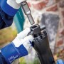 Detailaufnahme: LUX Abbruchhammer E-AHM-1700 mit Werkzeugaufnahme in Aktion.