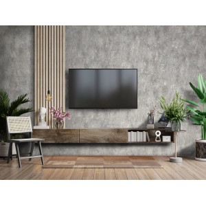 Grau-metallische Marburg Vliestapete in Betonoptik an Wohnzimmerwand.