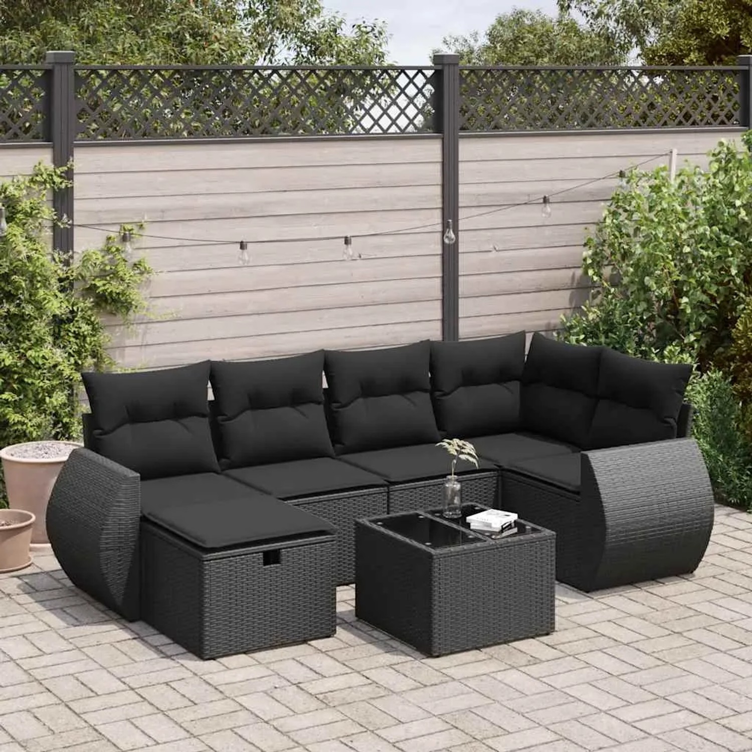 Schwarze 7-tlg. vidaXL Garten-Sofagarnitur aus Poly Rattan mit Kissen und Tisch.