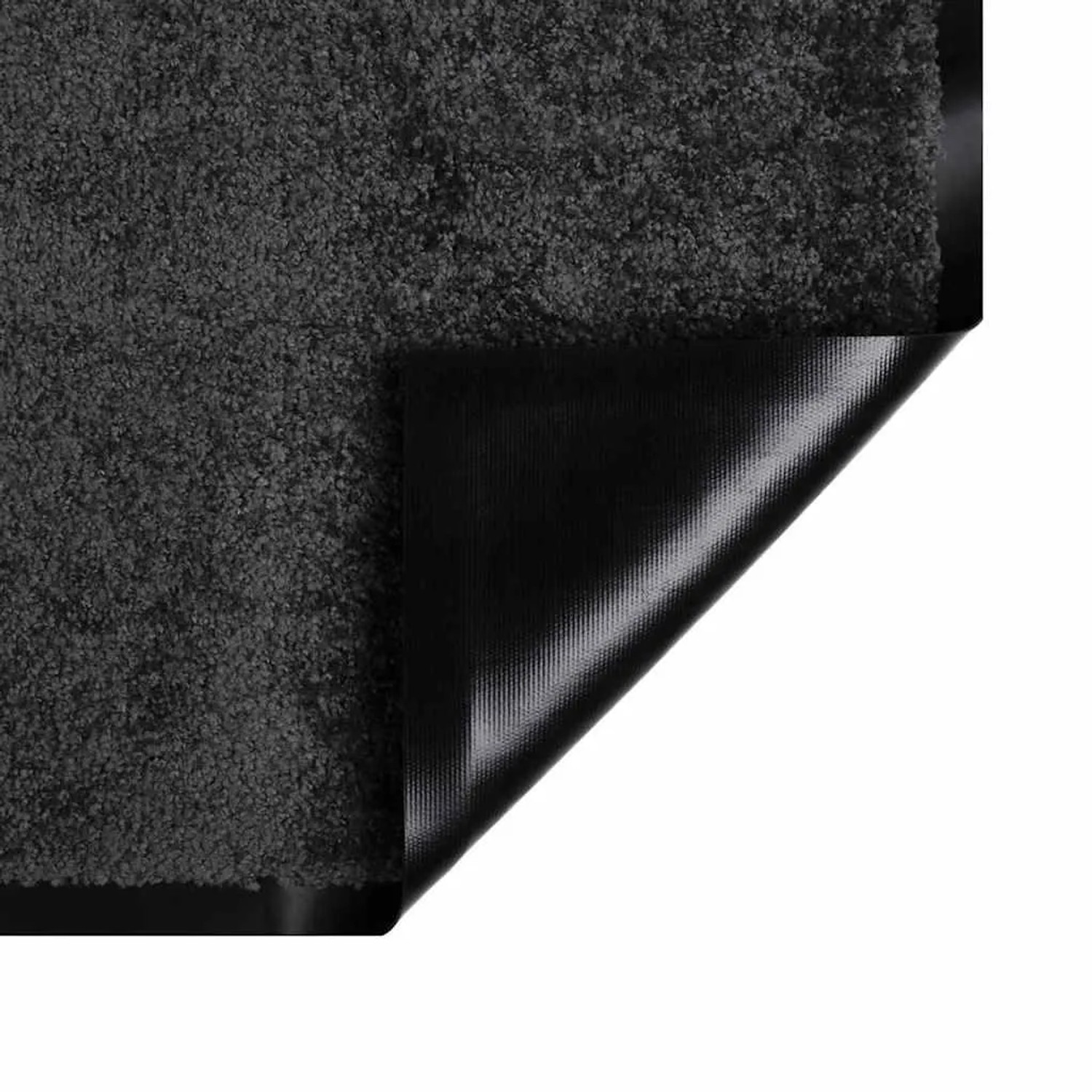 vidaXL Fußmatte Anthrazit aus Teddystoff, mit umgeklappter Ecke, die die schwarze, rutschfeste Latex-Unterseite zeigt.