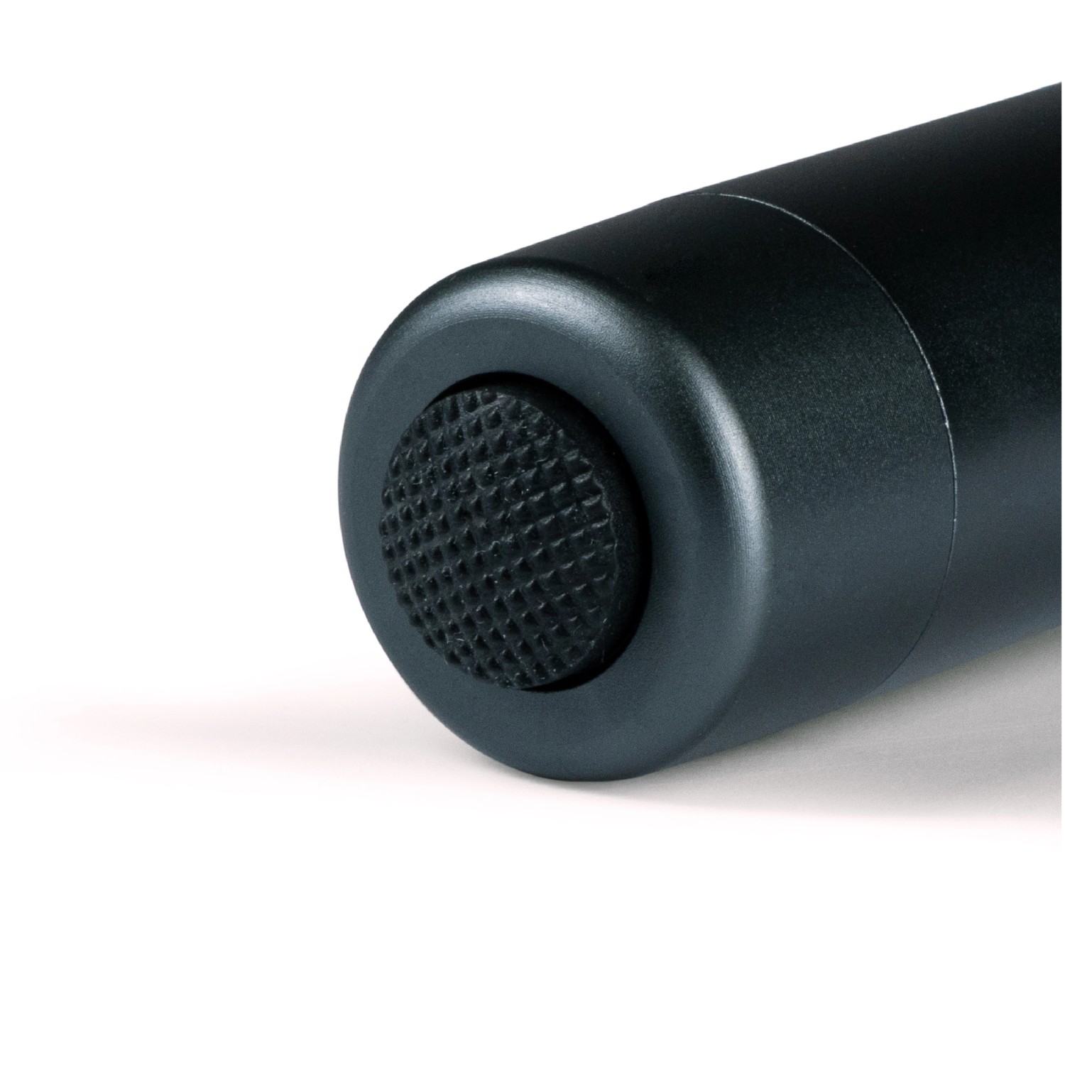 Detailaufnahme: Schwarzer An/Aus-Knopf der LED's Work Taschenlampe.