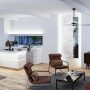 Wohnraum mit Paulmann LED-Strip MaxLED 1000 COB unter Kücheninsel für tageslichtweißes Licht.