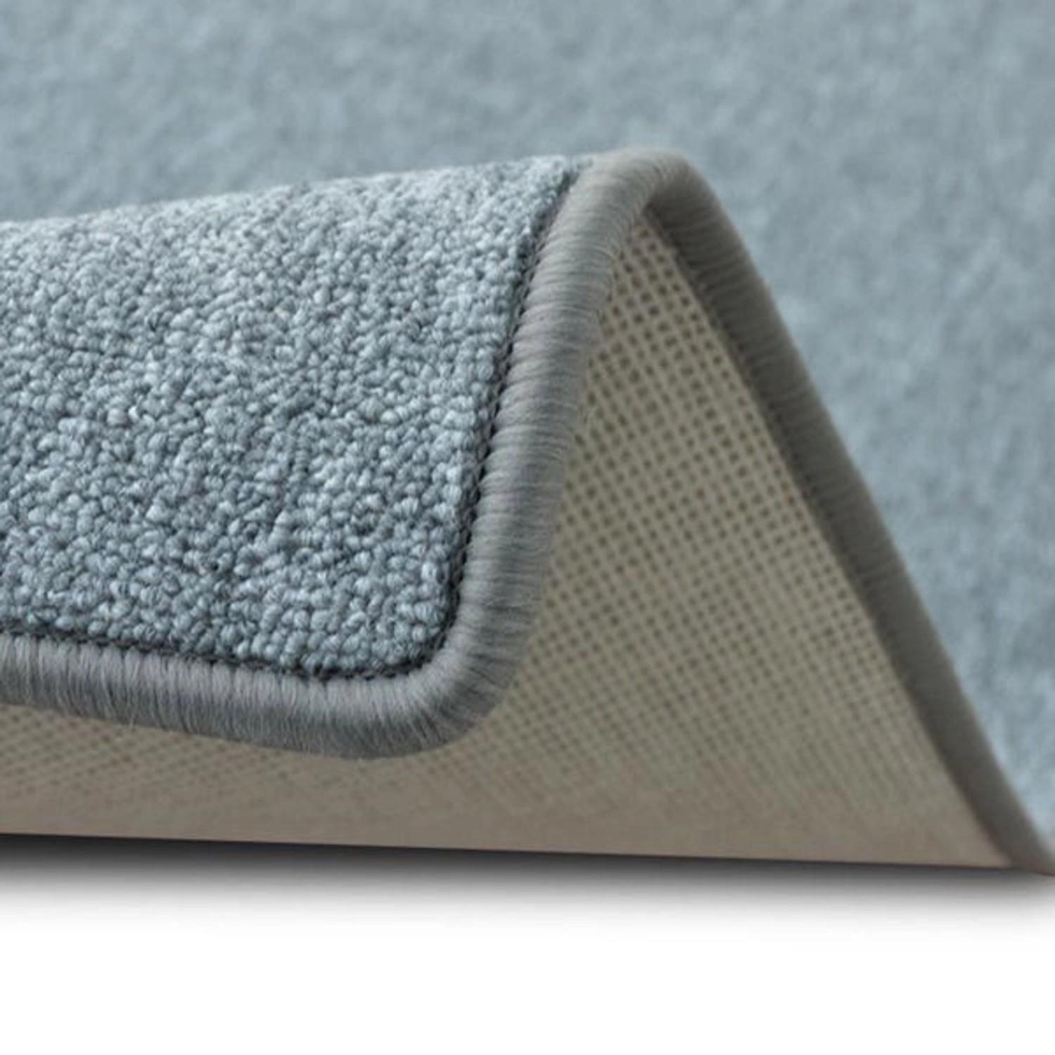 Detailansicht Karat Teppich London, hellgrauer Schlingenflor mit Umkettelung.