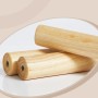 Detailaufnahme: Holzfüße des Songmics Garderobenständers Andi, Naturholz.