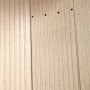 Detailaufnahme der Stahlverkleidung des Justus Tova W+ Kaminofens in Schwarz.