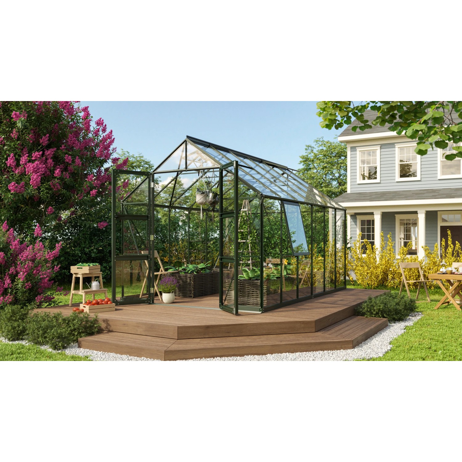 Vitavia Gewächshaus Olymp 9900 Smaragd mit Fundamentrahmen auf Holzterrasse im Garten.