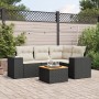 Schwarze 5-tlg. vidaXL Garten-Sofagarnitur aus Poly Rattan mit cremefarbenen Kissen.