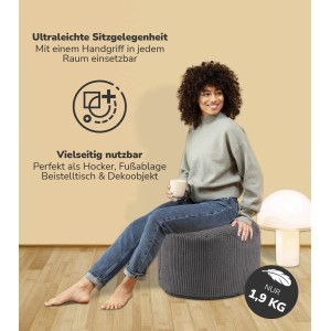 Anthrazitfarbener Cord Hocker "Der Faule Lenz" von mokebo als Fußhocker oder Sitzgelegenheit.