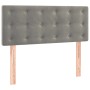 Hellgraues vidaXL Boxspringbett Kopfteil aus Samt mit Knopfheftung und Holzfüßen.