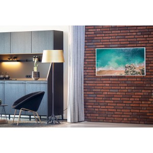 Könighaus Infrarotheizung Panorama-Serie mit Traumstrand-Motiv an Ziegelwand.