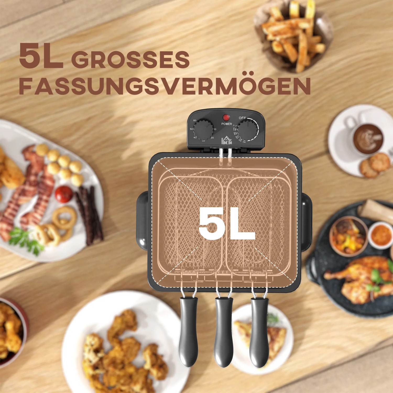 HOMCOM Fritteuse aus Edelstahl (silber) mit 5L Fassungsvermögen und Speisen auf einem Tisch.