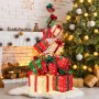 Festliche Weihnachtsdekoration: 15 beleuchtete Geschenkboxen in Rot, Grün, Creme, gestapelt als Baum. Ideal für Innenräume.