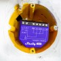 Shelly Relaismodul Unterputz PM Gen3 (lila) im Einbaukasten. Hausautomation.