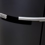 Detailaufnahme: Schwarzer Aduro 9.3 Kaminofen mit Stahlverkleidung und silbernem Griff.