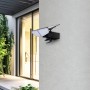 Schwarze Lindby LED Solar-Wandleuchte Naelin mit Bewegungsmelder und zwei Leuchten.