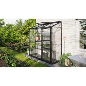 Vitavia Ida 1300 Anlehngewächshaus, schwarz, 1,3 m², mit Pflanzen im Garten.