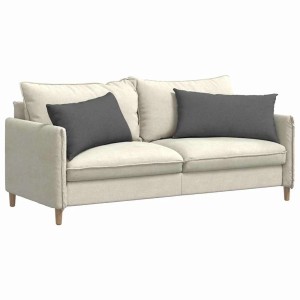 Zwei dunkelgraue Sofakissen (80x40 cm) aus Stoff auf einem Sofa.