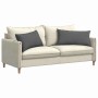 Zwei dunkelgraue Sofakissen (80x40 cm) aus Stoff auf einem Sofa.
