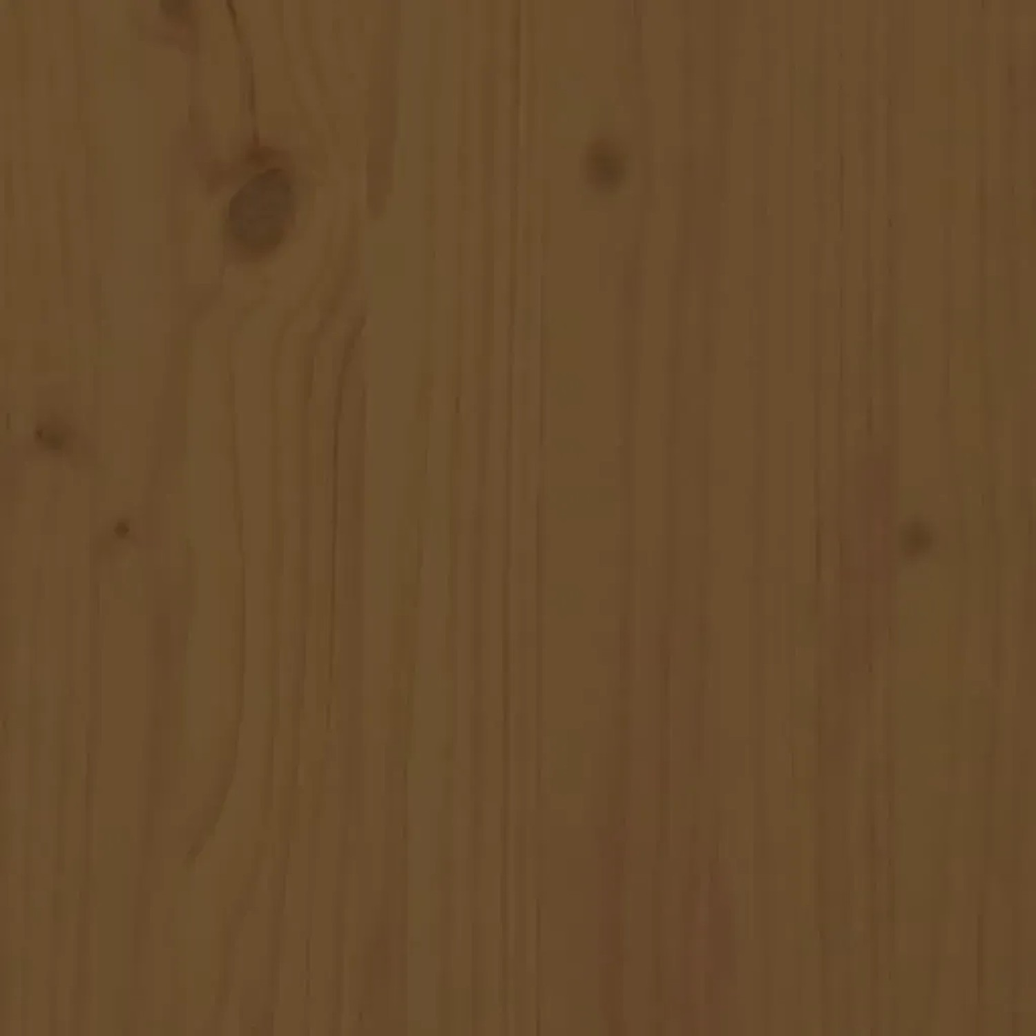 Detailaufnahme: Honigbrauner Couchtisch aus Kiefer Massivholz, Tischplatte mit Maserung.