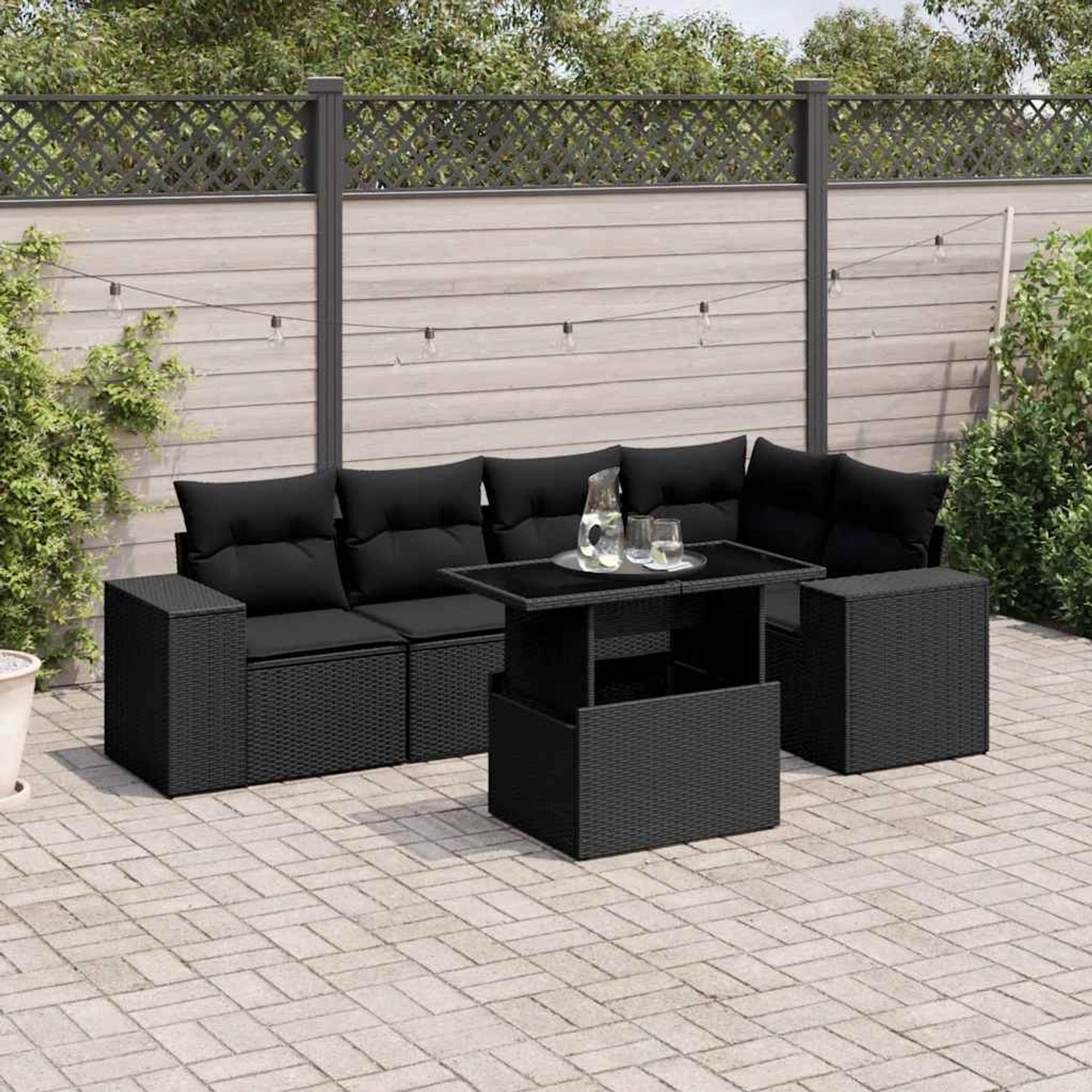 Schwarze 6-tlg. vidaXL Garten-Sofagarnitur aus Poly Rattan mit Kissen und Tisch.