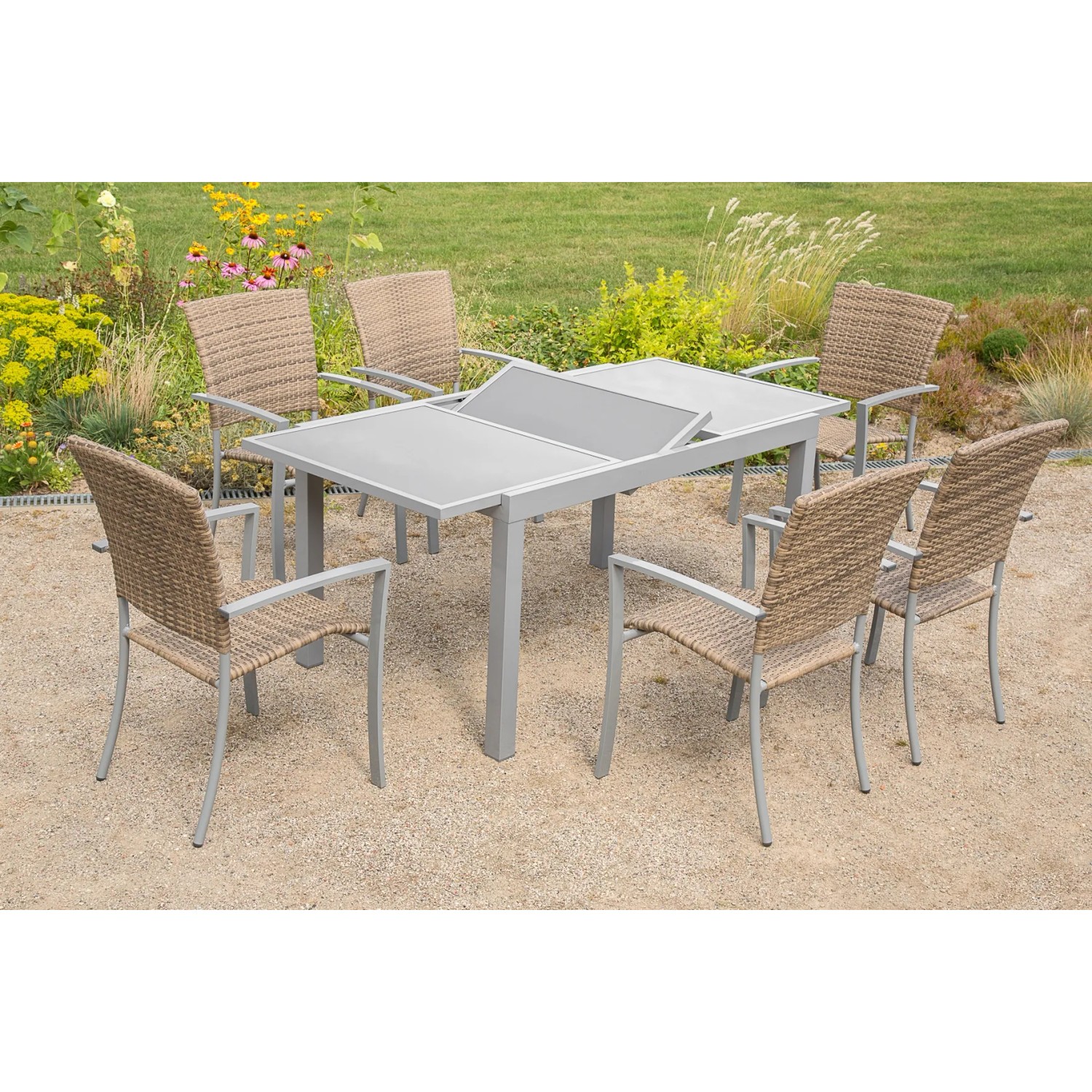 7-teiliges Gartenmöbel-Set Savona mit Ausziehtisch und 6 Stapelsesseln in Naturgrau.