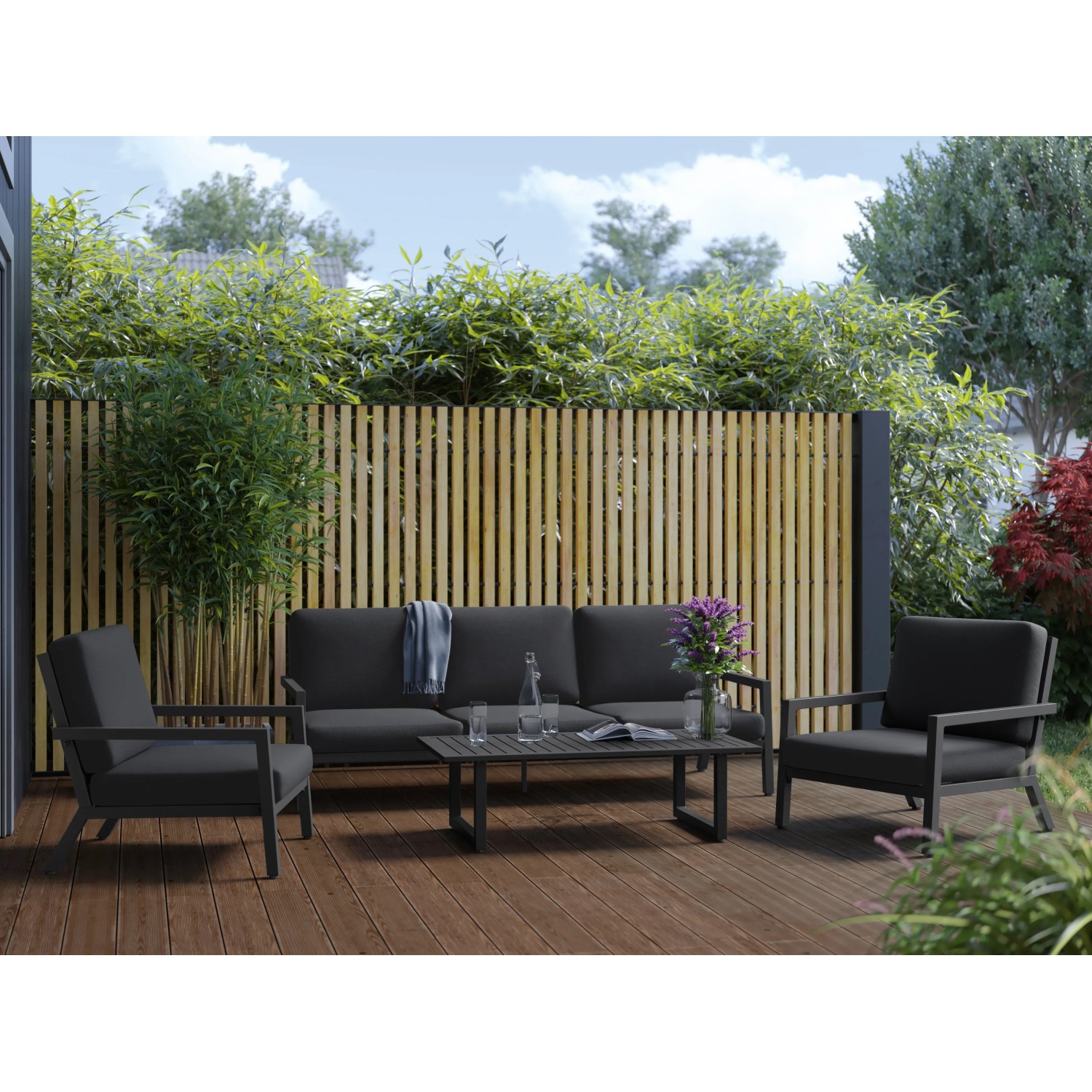 4-teilige Lounge-Gruppe Springtown in Schwarz/Dunkelgrau mit Sesseln, Bank und Tisch für Garten/Terrasse.