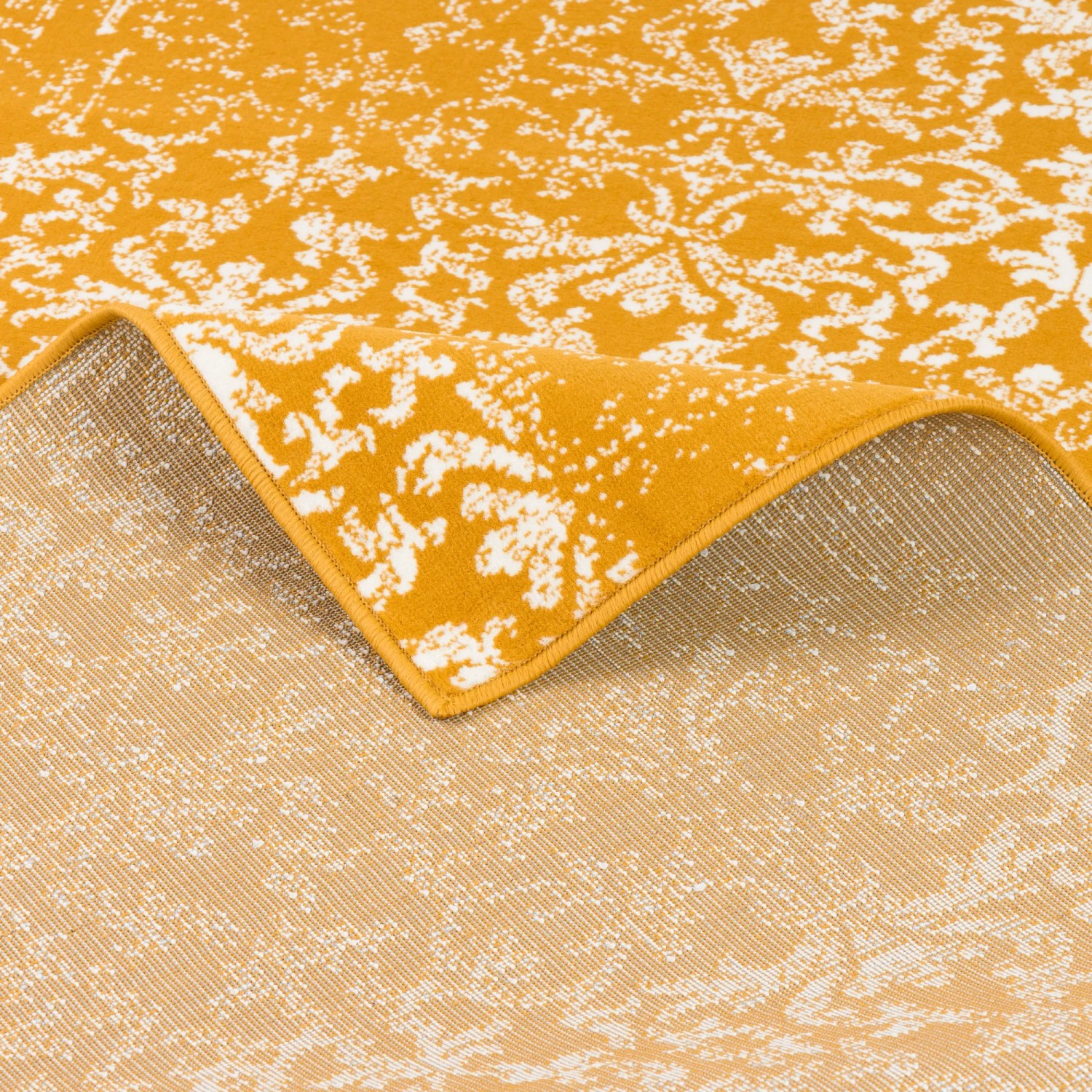 Designer Teppich Passion Vintage in Curry (120x170cm) mit floralem Muster.