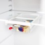 Transparenter Rotho Kühlschrankorganizer Cauma mit Schublade und Lebensmitteln im Kühlschrank.