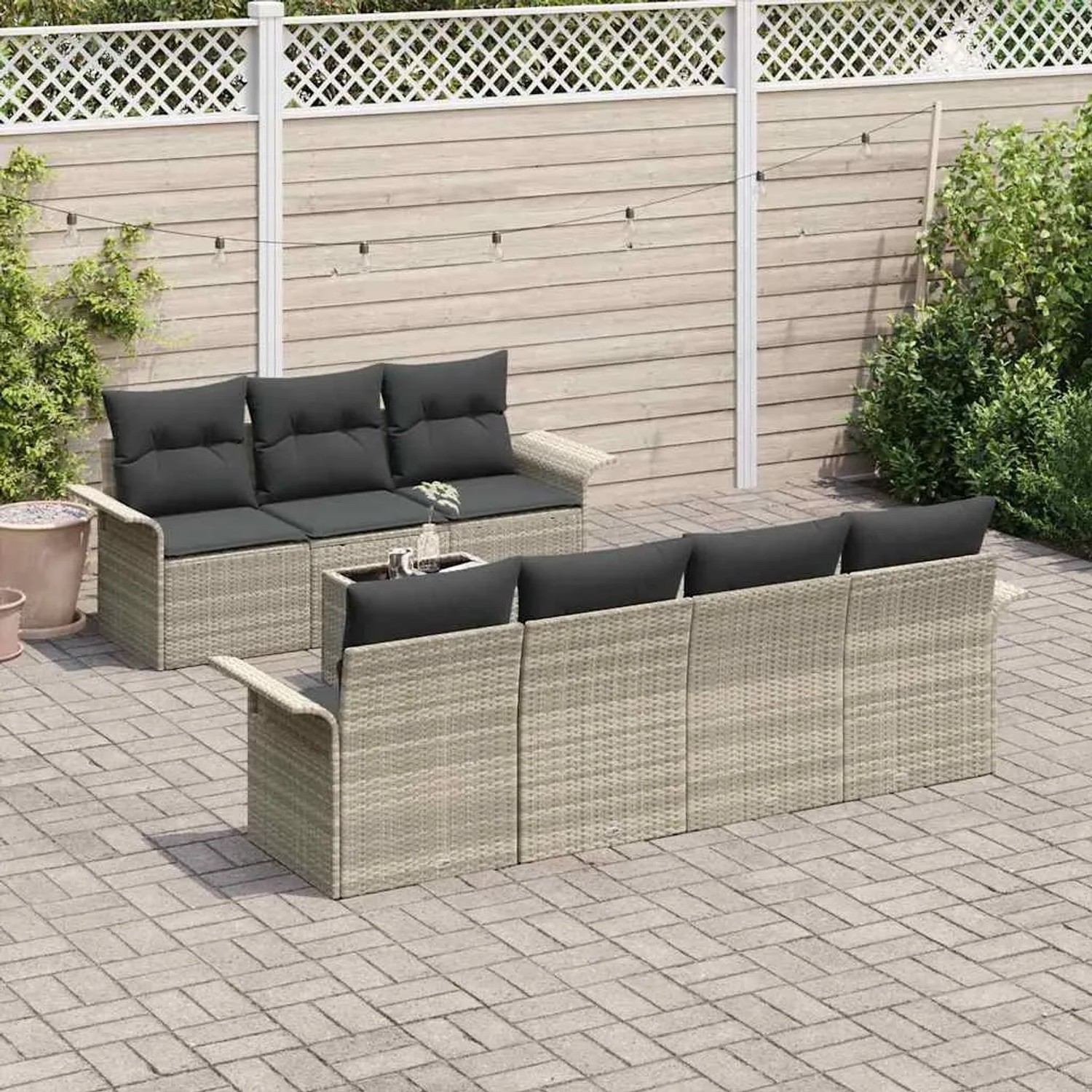Hellgraue 8-tlg. vidaXL Garten-Sofagarnitur aus Rattan mit anthrazitfarbenen Kissen.