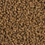 Nahaufnahme von COMPO Bio Gartendünger Pellets, geeignet für Gemüse und Zierpflanzen.