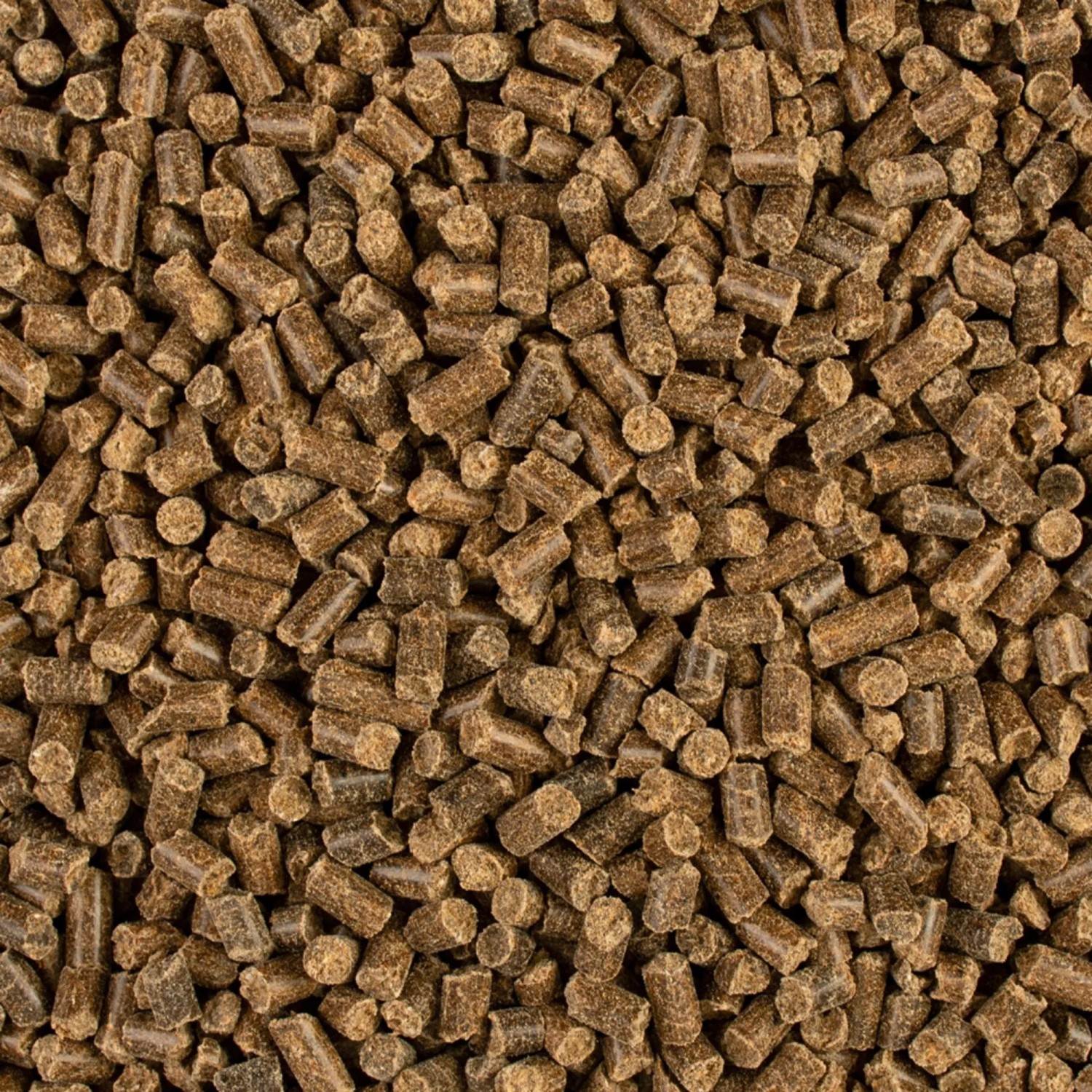 Nahaufnahme von COMPO Bio Gartendünger Pellets, geeignet für Gemüse und Zierpflanzen.