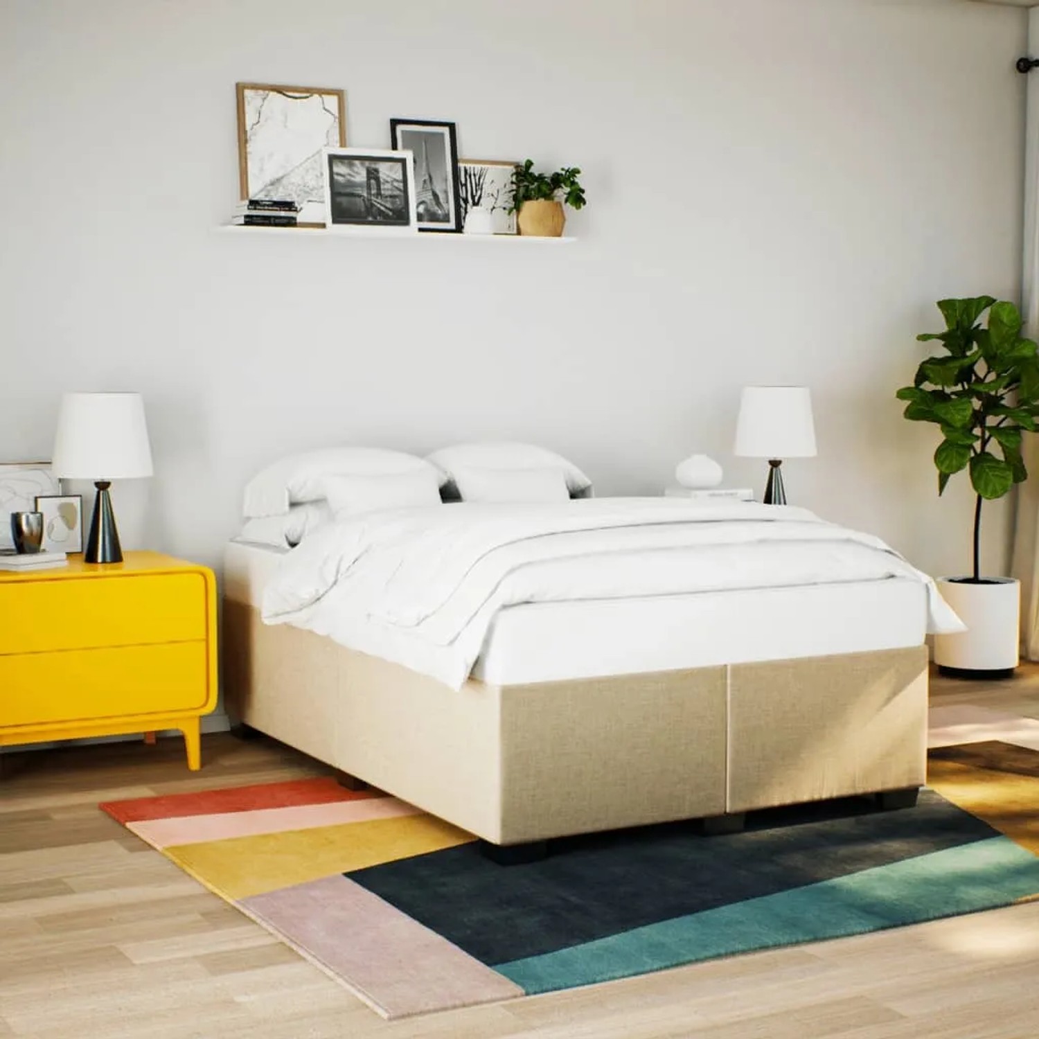 Cremefarbenes vidaXL Boxspringbett 140x200 cm mit Matratze im Schlafzimmer.