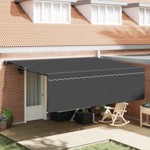Anthrazitfarbene vidaXL Einziehbare Markise (450x350 cm) am Haus montiert.