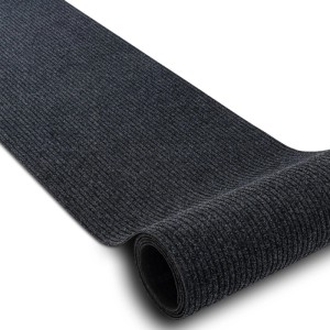 Anthrazitfarbene RugsX Türmatte, rutschfest, gerollt. Teppich für Innen- und Außenbereich.