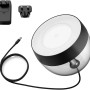 Philips Hue Iris Tischleuchte, schwarz, mit Zubehör wie Netzteil und Steckeradaptern.