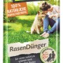 Verpackung Compo BIO Rasendünger 10,05 kg mit Frau und Hund im Garten. Bio-Rasendünger für einen grünen Rasen.