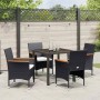 Schwarze 5-tlg. vidaXL Garten Essgruppe aus Poly Rattan mit Tisch, Stühlen und Kissen.